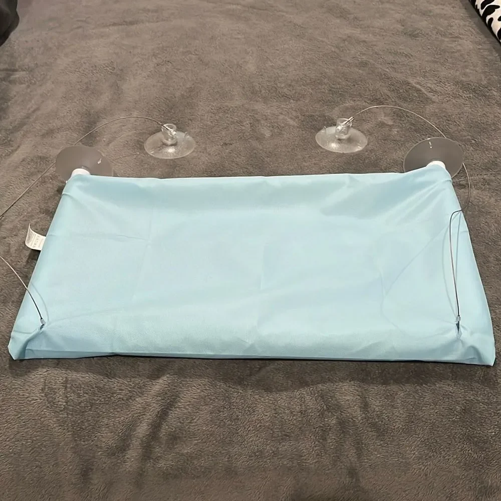 Light blue perch for your cat to put in the window with suction